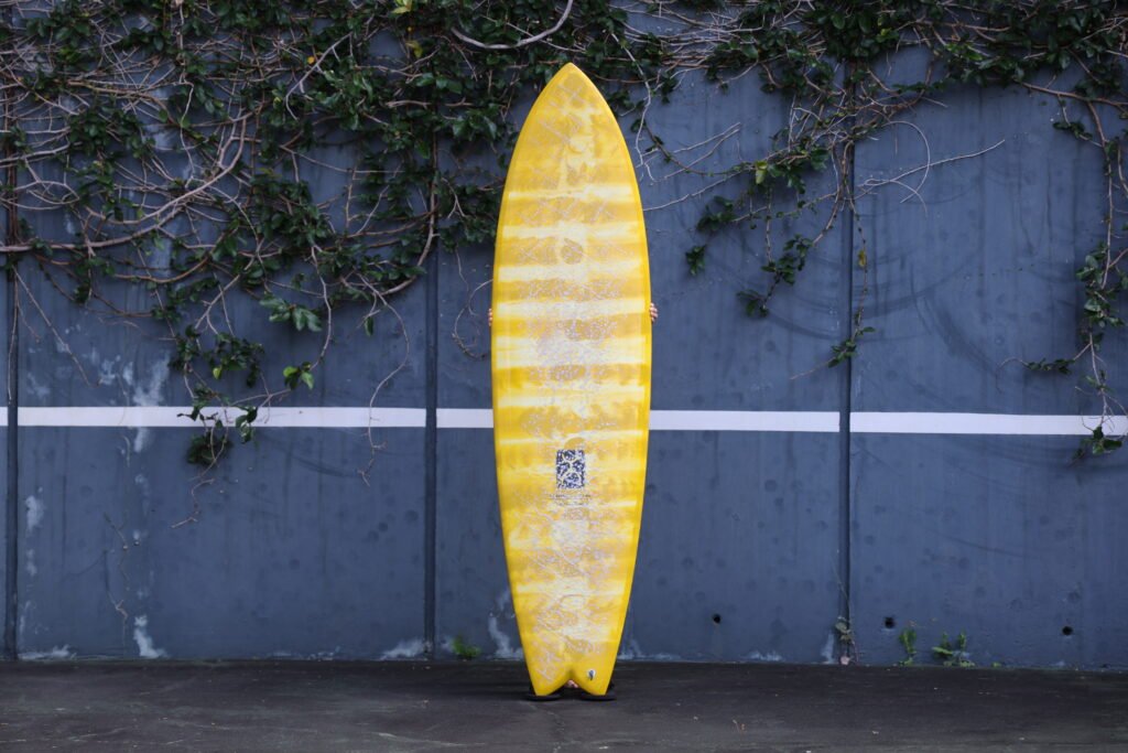 Seaside and beyond thunderbolt red surfboard